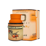 A 100ml bottle and box of Armaf Odyssey Mandarin Sky Vintage Edition eau de parfum, featuring an orange and cream color scheme with illustrated oranges on the bottle, this fragrance captures a citrus amber essence reminiscent of the original Odyssey line.