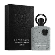 Afnan Supremacy Collectors Edition 100ml EDP for men by Afnan comes in a sleek bottle with a black cap, displayed next to its textured black box.