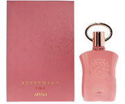 A pink box labeled "Afnan Supremacy Gala 90ml Eau De Parfum" by Afnan stands next to a matching pink bottle with a gold cap and circular handle, presenting an elegant women's fragrance.