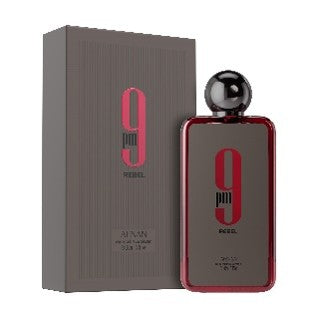 Afnan 9 AM Rebel 100ml Eau De Parfum by Afnan, with its bold packaging and metallic cap, is a striking fragrance for men.
