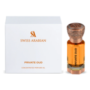 The Swiss Arabian Private Oud 12ml Concentrated Perfume Oil is shown next to its elegant white and gold packaging box.