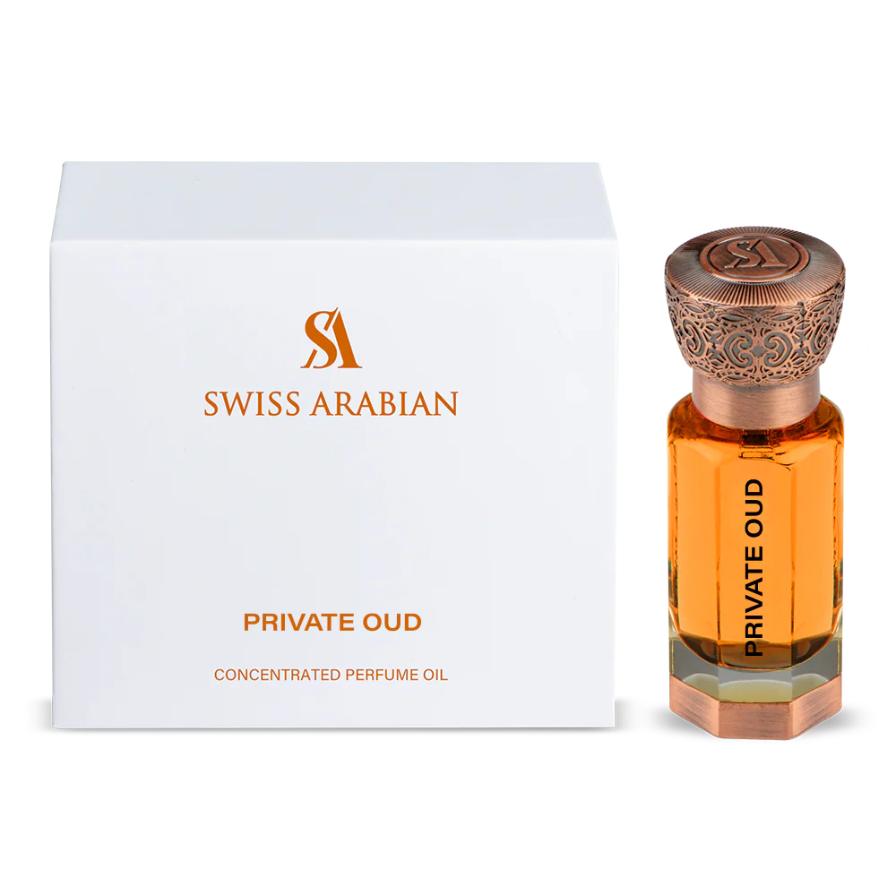 The Swiss Arabian Private Oud 12ml Concentrated Perfume Oil is shown next to its elegant white and gold packaging box.