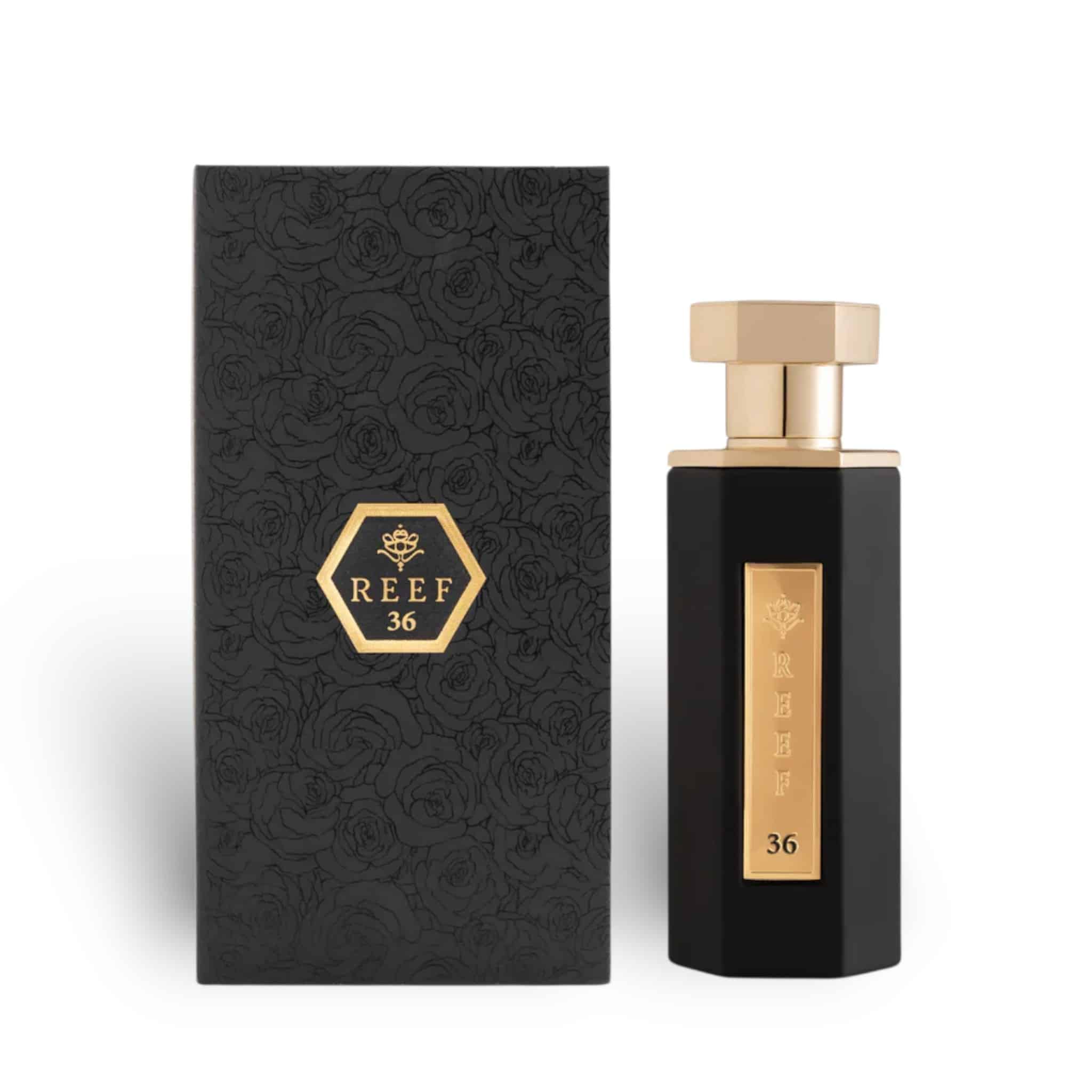 A black and gold "Reef 36 100ml EDP" perfume bottle by Reef stands beside a matching floral-patterned box with a gold hexagonal logo, reflecting the Oriental Floral allure of this Eau De Parfum.