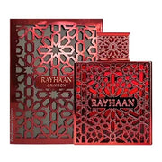 A vibrant red Rayhaan Crimson 100ml EDP perfume bottle and its matching box, both adorned with intricate geometric patterns and the “Rayhaan Crimson” label on the front, perfectly capture the essence of this warm and spicy men’s fragrance from Rayhaan.