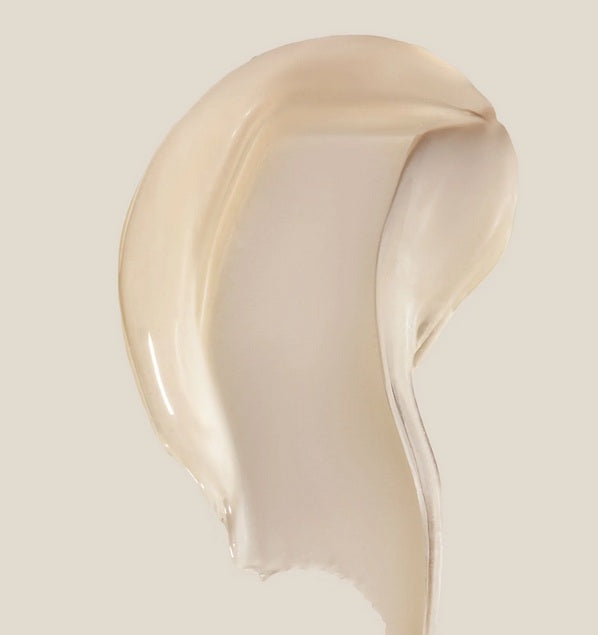 A close-up of Summer Fridays Lip Butter Balm Sweet Mint, showing its beige creamy texture on a light background, reminiscent of a rich overnight vegan lip mask.