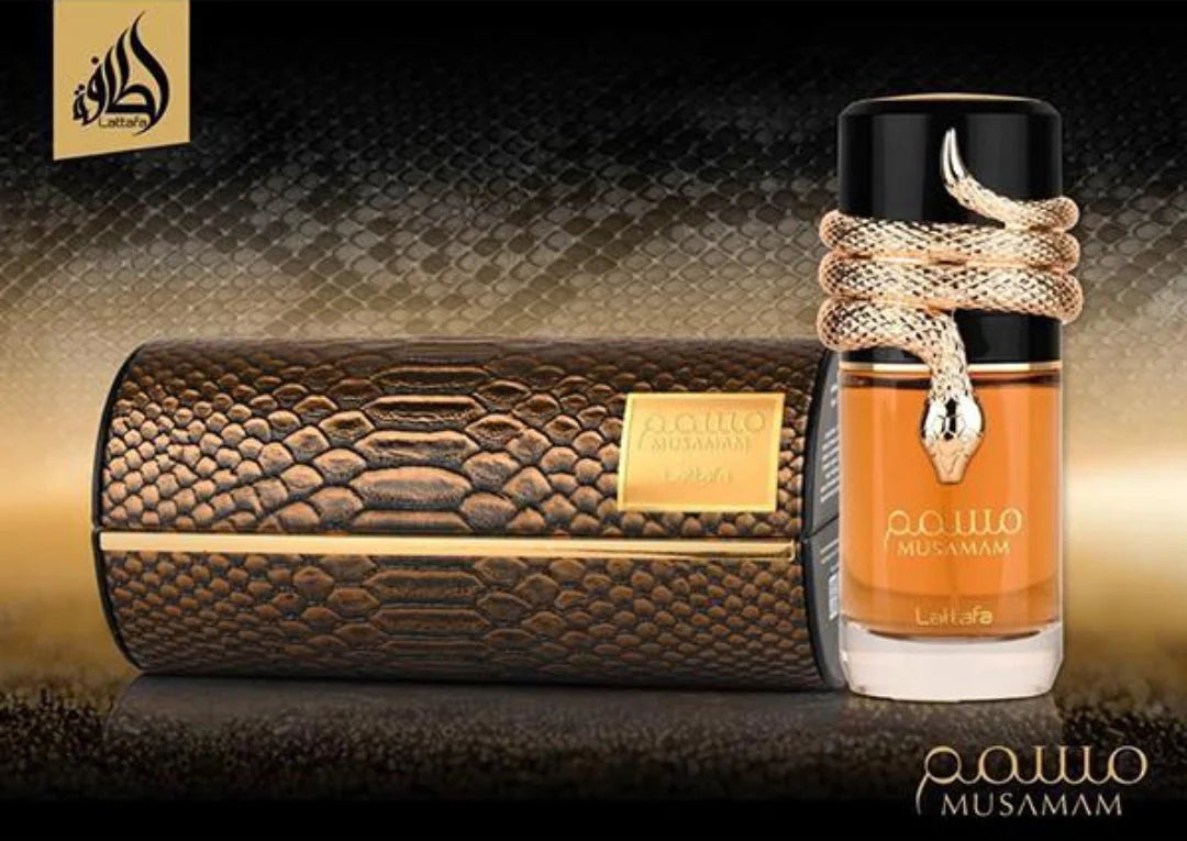The Lattafa Musamam 100ml Eau De Parfum, featuring a gold snake design, is displayed beside its textured, snake-patterned case on a gradient background, showcasing this luxurious unisex fragrance from Lattafa.