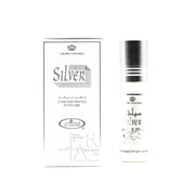 Crown Perfumes Al-Rehab Silver 6ml concentrated perfume oil is shown alongside its sleek white and silver box, featuring a delightful Woody Floral Musk fragrance for men and women.