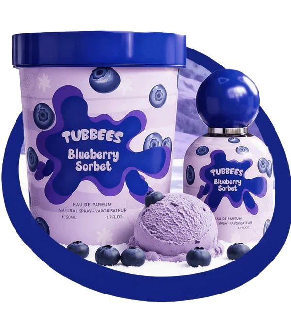 A bottle of Tubbies Tubbees Blueberry Sorbet EDP is displayed alongside a scoop of blueberry sorbet and fresh blueberries, all arranged neatly on a white surface.