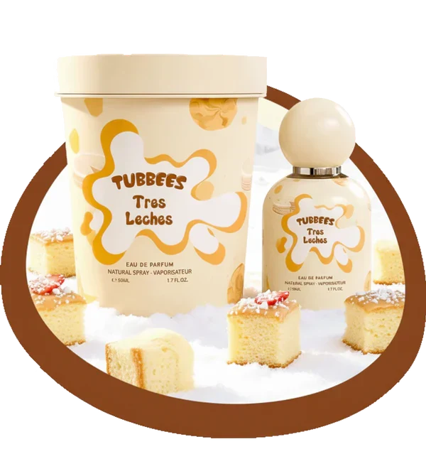 A bottle and tub of Tubbees Tres Leches EDP by Tubbees are displayed amidst squares of tres leches cake on a white surface with a brown circular border, perfectly capturing the delectable essence of this gourmand fragrance. This vanilla-rich perfume evokes the creamy sweetness of your favorite dessert with every spritz.