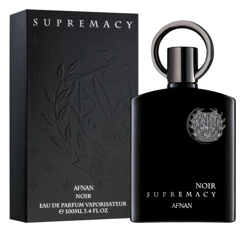 A 100ml black bottle of Afnan Supremacy Noir EDP by Afnan, a bold Oriental Spicy scent, is shown next to its sleek matching black box with silver lettering.