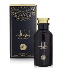 A bottle of Dubai Perfumes Ard Al Zaafaran Ahla Awqat 80ml eau de parfum with a box next to it, emitting an alluring fragrance.