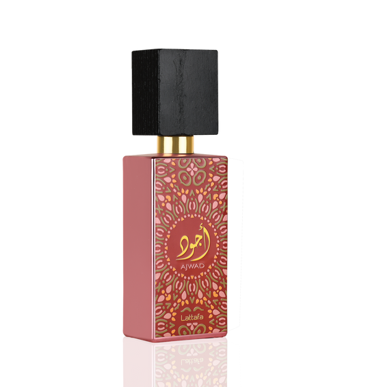 A rectangular perfume bottle with intricate patterns and Arabic script, labeled 