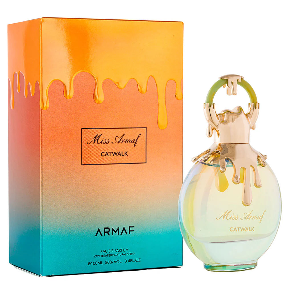 The Armaf Miss Armaf Catwalk 100ml EDP features a gold-capped bottle next to a vibrant gradient box with yellow drips and branded text—an eye-catching women’s fragrance by Armaf.