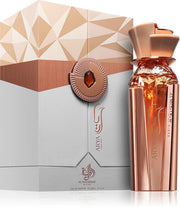 A rose gold bottle of Al Wataniah Arya Peony Rose 100ml Eau De Parfum stands beside a geometric-patterned box adorned with "ARYA," Arabic text, and Al Wataniah branding, highlighting notes of Peony Rose.
