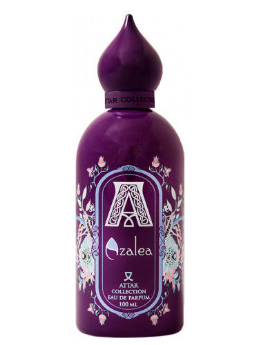 The exquisite Attar Collection Azalea 100ml Eau De Parfum features a purple bottle adorned with decorative floral patterns and a pointed cap.