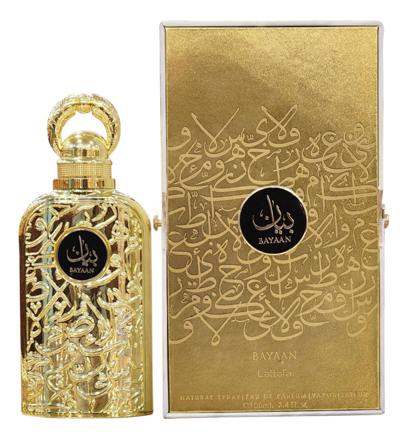 Load image into Gallery viewer, A golden Lataffa Bayaan 100ml Eau De Parfum bottle with intricate metalwork next to its matching ornate gold box, both adorned with Arabic script and the logo &quot;Lattafa Bayaan.
