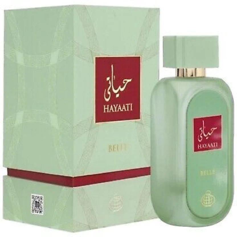 A green rectangular Fragrance World Hayaati Belle 100ml Eau De Parfum bottle with red and gold accents stands beside its matching box, offering a Floral Fruity scent for men and women.