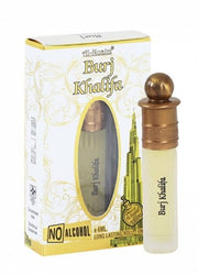 A 6ml bottle of Al Nuaim Barj Khalifa Attar Perfume by Al Nuaim with a gold cap, displayed beside its white and gold "No Alcohol" box featuring a Burj Khalifa illustration.