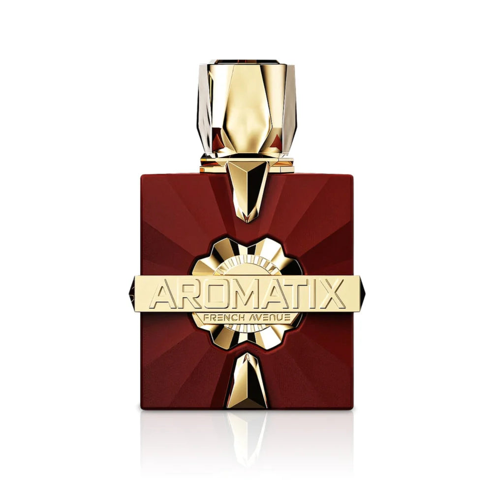 A square red bottle with gold accents and a geometric cap, labeled "French Avenue Carnal Desire 100ml Extrait De Parfum," this unisex scent from French Avenue exudes sophistication and allure.