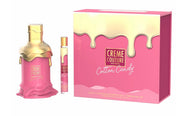 The Emper Creme Couture Cotton Candy 100ml EDP set by Emper includes an Eau De Parfum, rollerball, and a matching box with pink and gold dripping design.
