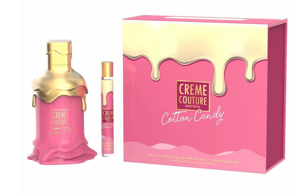 The Emper Creme Couture Cotton Candy 100ml EDP set by Emper includes an Eau De Parfum, rollerball, and a matching box with pink and gold dripping design.