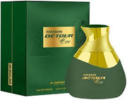 A green and gold bottle of AL Haramain Detour Eco 100ml Eau De Parfum sits beside its matching box, reflecting the signature style of AL Haramain.