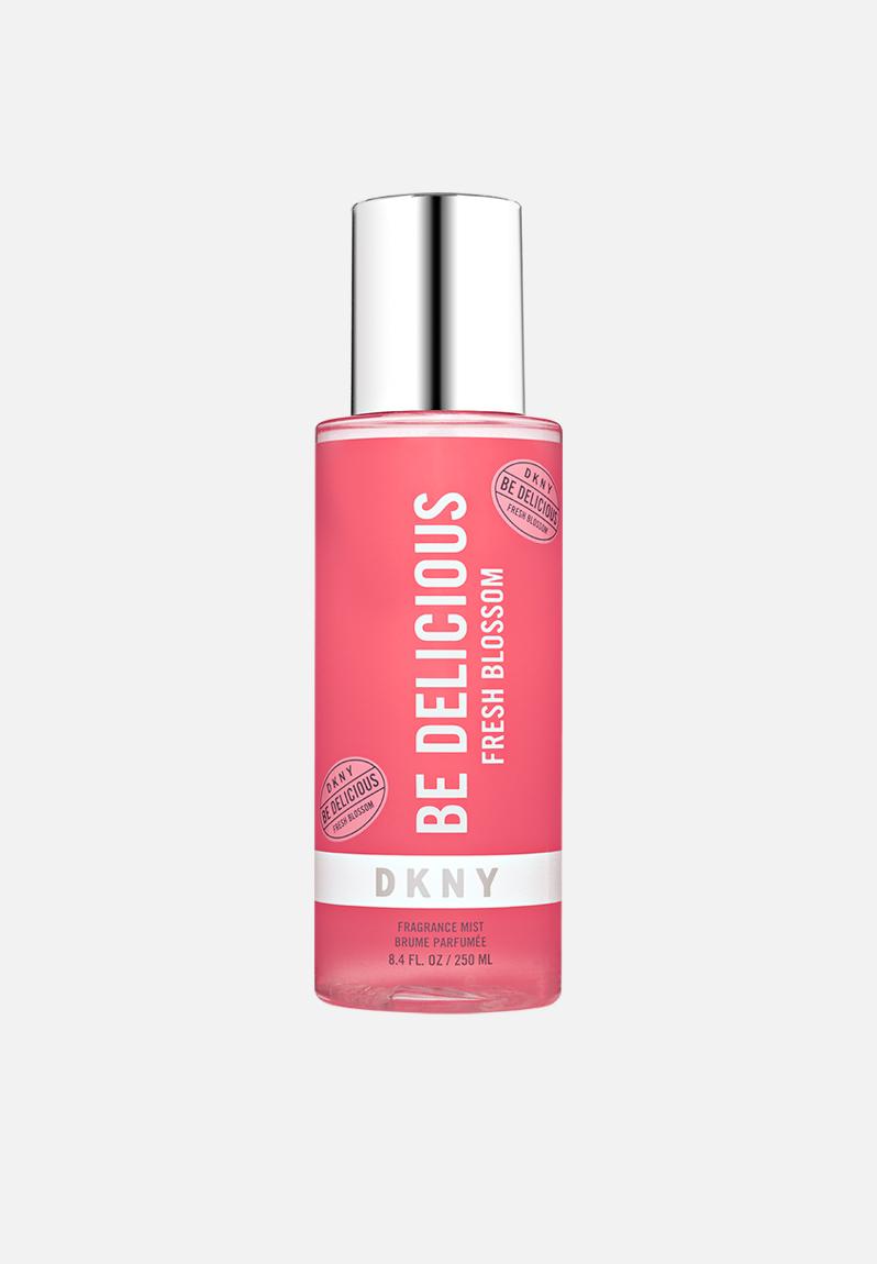 The DKNY Body Mist Be Delicious Fresh Blossom 250ml comes in a pink bottle with a silver cap.