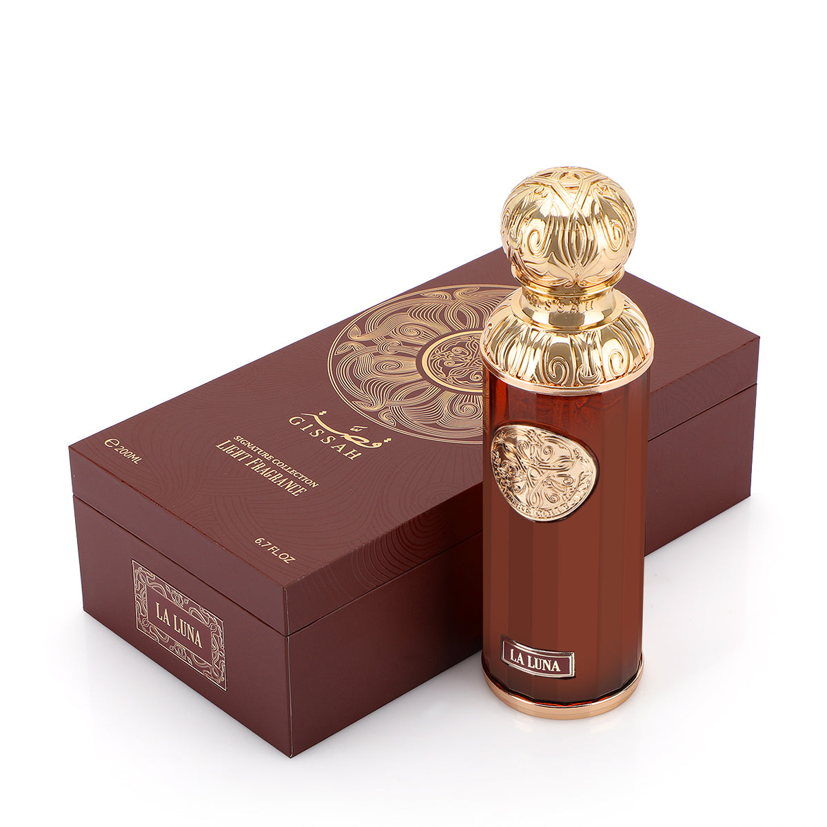 The elegant Gissah La Luna 200ml Eau De Parfum, with gold accents, stands beside its maroon and gold box—an oriental ambery woody fragrance by Gissah.