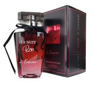 A bottle of Fragrance World LA Nuit Rose 100ml EDP with a black cap and ribbon sits beside its matching black and pink box—an captivating scent for men and women from Fragrance World.