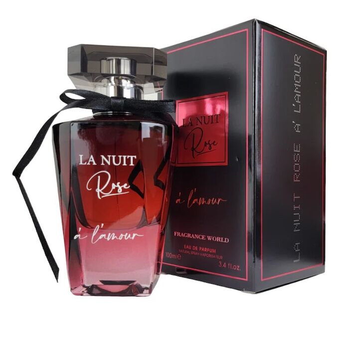 A bottle of Fragrance World LA Nuit Rose 100ml EDP with a black cap and ribbon sits beside its matching black and pink box—an captivating scent for men and women from Fragrance World.