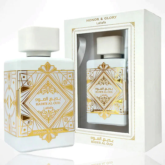 A bottle of Lattafa Badee Al Oud Honor & Glory 100ml Eau De Parfum by Lattafa next to its packaging.