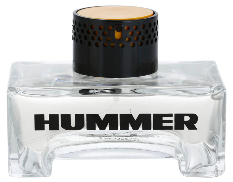 The Hummer 125ml Eau De Toilette by Rio Perfumes is housed in a clear glass bottle with a black and gold cap and bold "HUMMER" text on the front, offering an oriental fragrance for men.