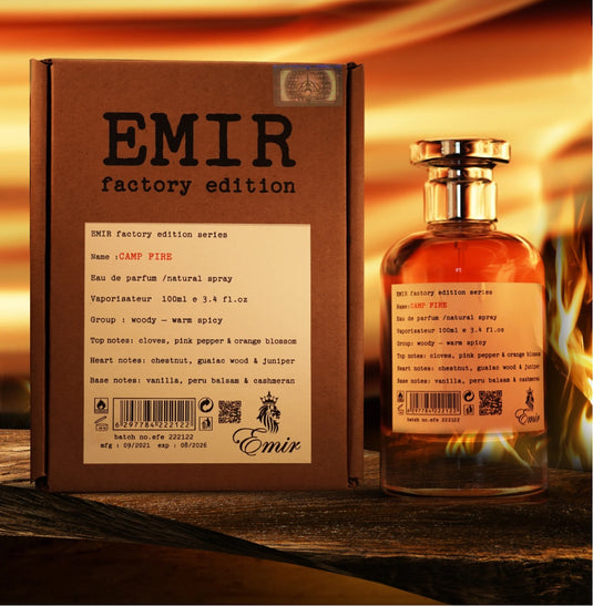 A bottle of Emir Camp Fire Factory Edition 100ml Eau De Parfum by Paris Corner with a box next to it.