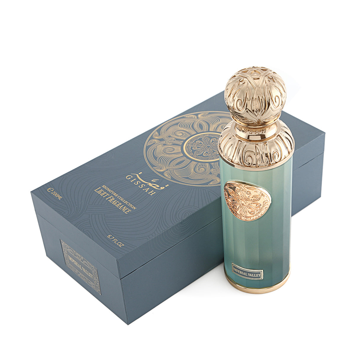 A stylish 200ml Gissah Imperial Valley EDP bottle with a gold cap stands by a matching blue and gold box, offering an elegant unisex fragrance from Gissah.