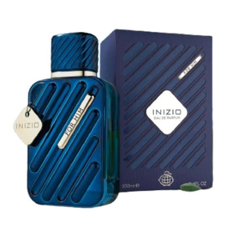 A 100ml Fragrance World Inizio For Him Eau de Parfum bottle by Rio Perfumes is shown next to its matching blue box packaging.