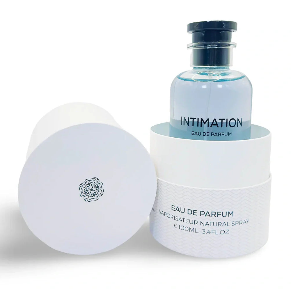 A blue Emper Intimation 100ml EDP bottle stands in an open white cylindrical box with floral logo and text—an elegant men’s fragrance by Emper.