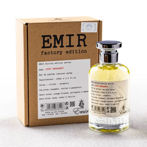 A bottle of Paris Corner's Emir Just Bergamot 100ml Eau De Parfum, filled with a captivating fragrance, placed elegantly in front of a box.