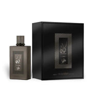 A rectangular black Al Wataniah Kayaan Classic 100ml EDP bottle is displayed beside its matching black box, both featuring the Al Wataniah branding and classic design.