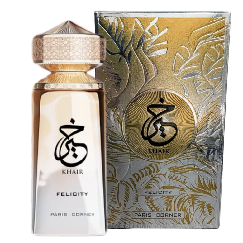 A Paris Corner Khair Felicity 100ml Eau De Parfum bottle sits next to its elegant gold and silver-accented box, highlighting the brand’s refined unisex fragrance.