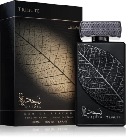 A black Lattafa Eau De Parfum bottle labeled "Lattafa Najdia Tribute" with a detailed leaf design, next to its packaging box featuring a golden leaf motif.