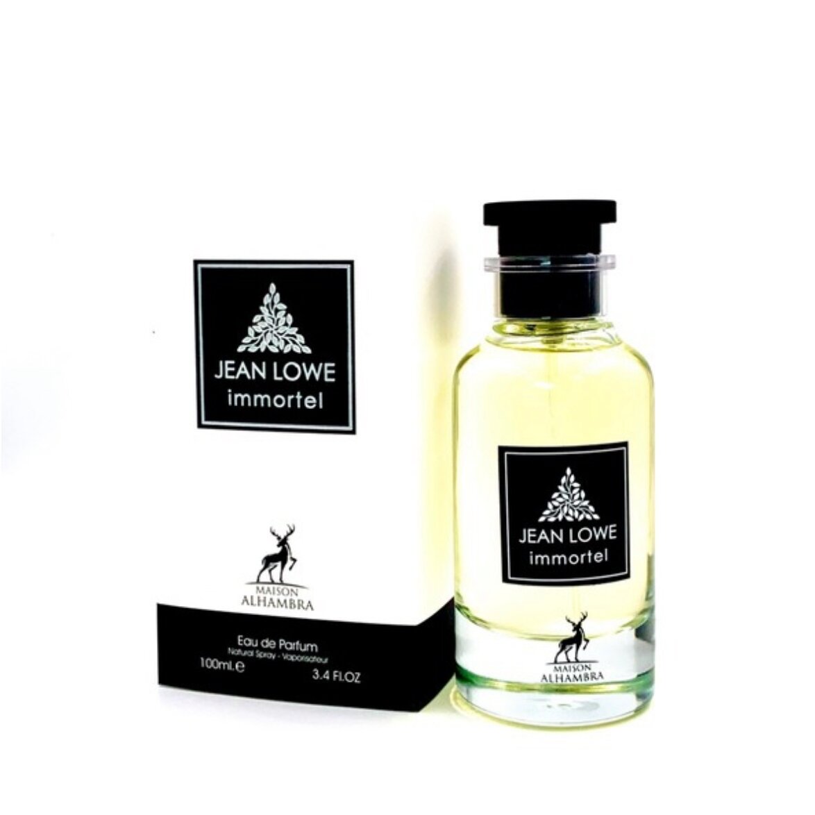 A 100ml bottle of Maison Alhambra Jean Lowe Immortel Eau De Parfum stands beside its matching white box, both adorned with black labels featuring white text and a tree motif, showcasing the brand’s elegant, refined aesthetic.