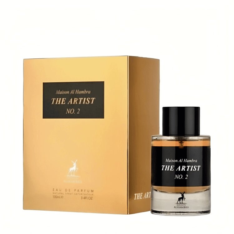The Maison Alhambra The Artist No.2 100ml EDP bottle is shown alongside its coordinating gold box, both adorned with black labels and white lettering. This unisex fragrance by Maison Alhambra features Indian Oud for a sophisticated scent, beautifully packaged in its distinctive signature design.