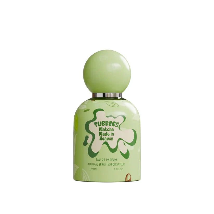 A light green Tubbees Matcha Made in Heaven EDP bottle by Tubbies features a round cap and playful text on the front, making it a charming unisex fragrance.