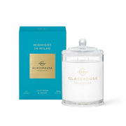 The Glasshouse Midnight in Milan Soy Candle 380g, featuring two wicks in a clear jar, pairs perfectly with the blue box. Enhance your ambiance with the 250ml diffuser for a seamless fragrance experience.