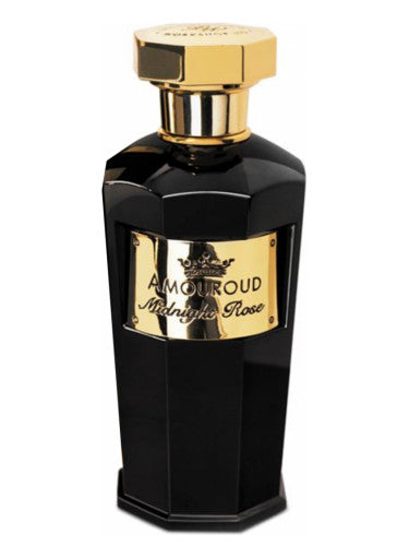 The Amouroud Midnight Rose Eau De Parfum bottle, in black and gold with a faceted design, exudes elegance. This exquisite fragrance for both men and women is as captivating as the Amouroud Sunset Oud.