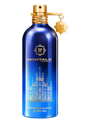 The Montale Paris Rendez-Vous A Milan 100ml Eau De Parfum features a blue and gold bottle with Milan's cathedral, a gold cap, and charm—a versatile Montale Paris fragrance for men and women.