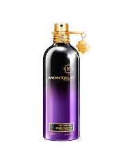 A purple and gold Montale Paris Intense Starry Nights 100ml Extrait de Parfum bottle, complete with a spray nozzle and small charm, is displayed on a white background, perfectly showcasing the luxurious elegance of Montale Paris fragrances.