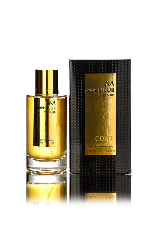 A bottle of Monsieur Intense Gold 100ml EDP by Monsieur next to its packaging.