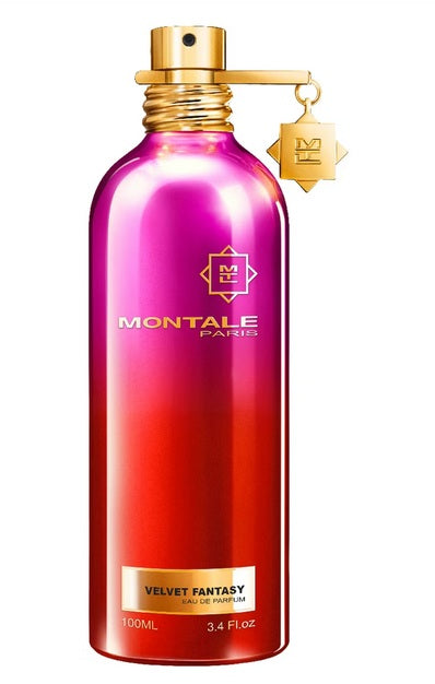 The Montale Paris Velvet Fantasy 100ml EDP bottle showcases metallic pink and red tones with a gold cap and charm, capturing the essence of an Oriental Floral fragrance.