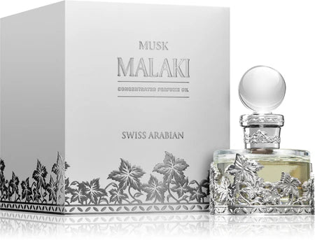 A bottle of Rio Perfumes Swiss Arabian Musk Malaki Concentrated Oil Perfume is displayed beside its white and silver box, highlighting the elegance of this luxurious fragrance.